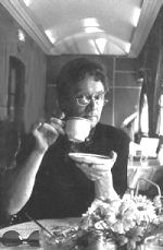 Photograph of Tom drinking tea at the Pump Rooms